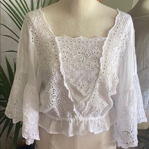 White eyelet blouse with flows sleeves